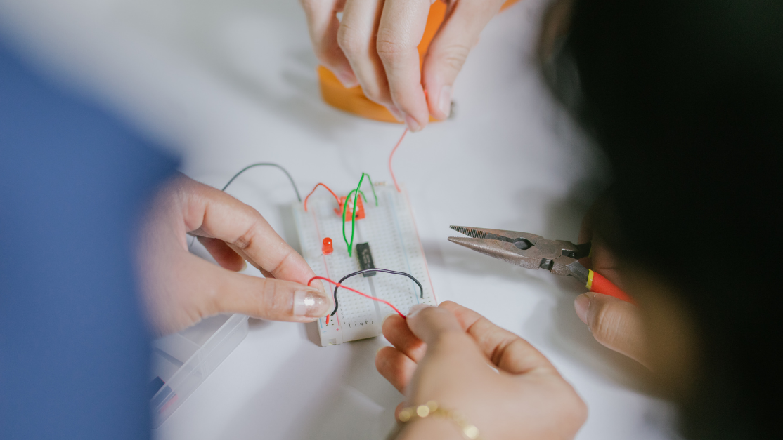 students working on an electrical circuit