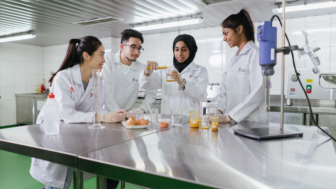 students working in a sterile kitchen