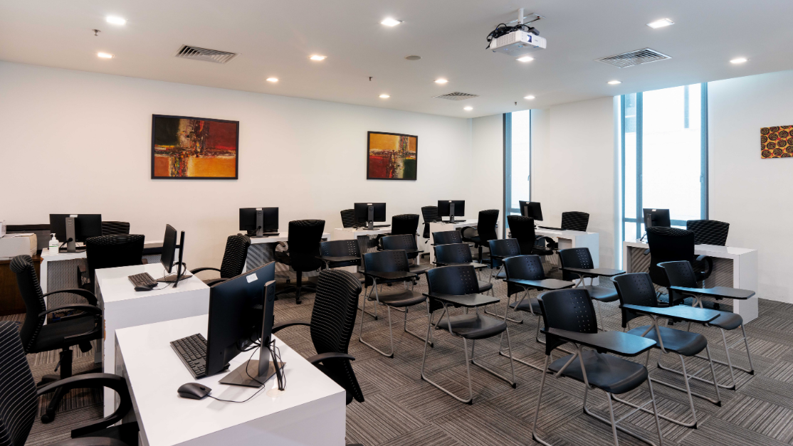 rows of chairs in a hotel front office room