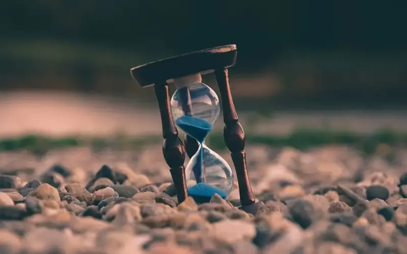 Hourglass on some rocks
