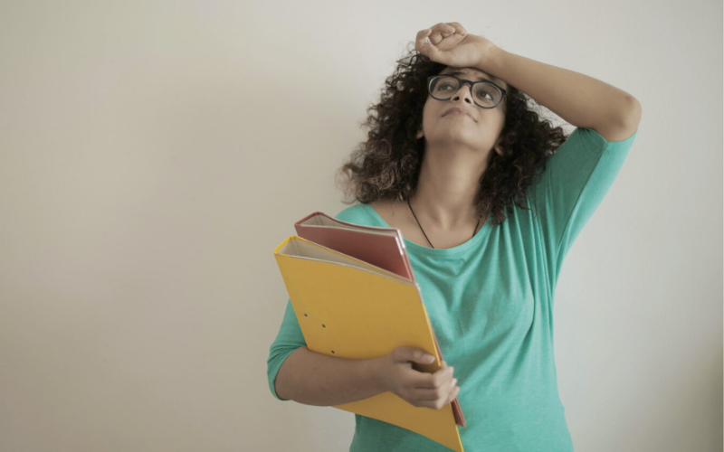 women with left hand on head