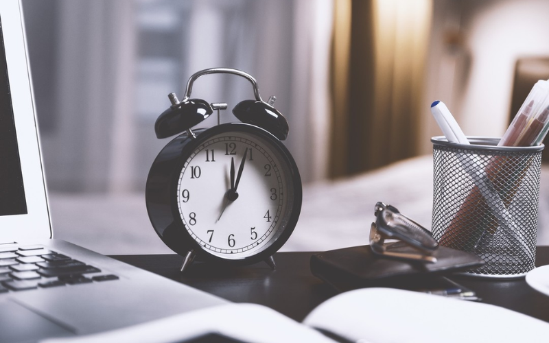 alarm clock on table