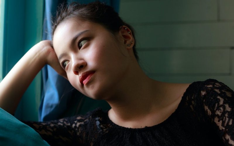 Woman staring out the window