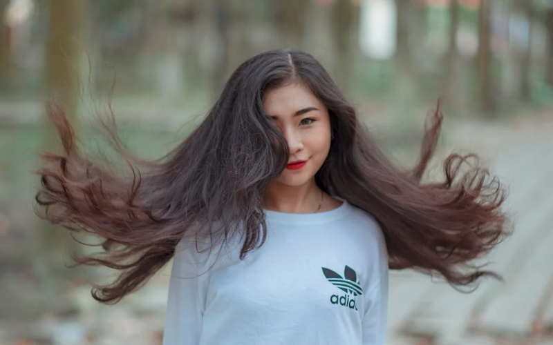 girl with her hair flying around
