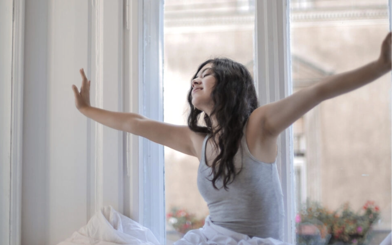 girl waking up from bed