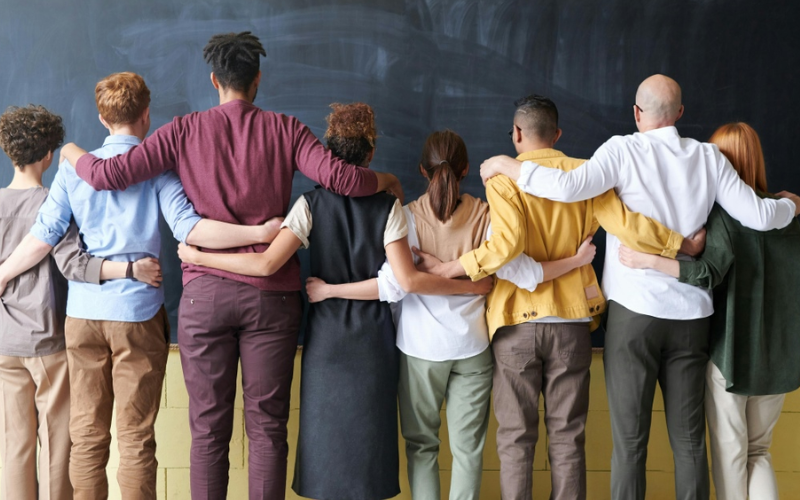 A classroom of students celebrating diversity
