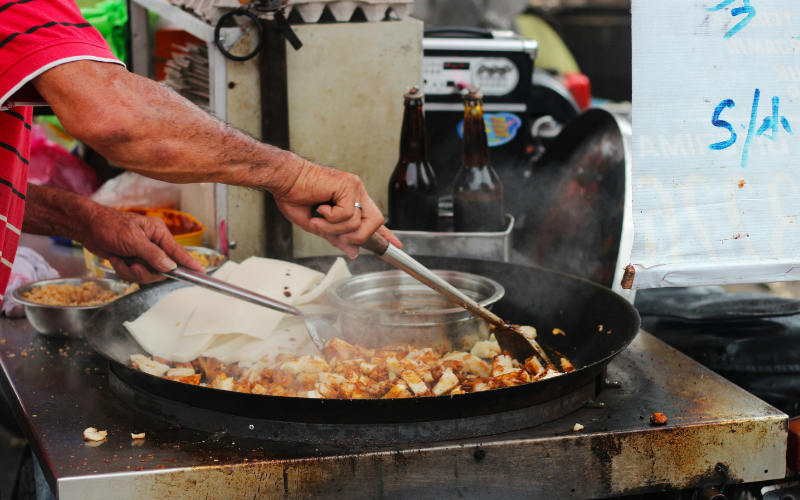 Picture of a hawker cooking