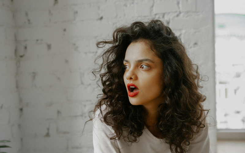 Women displaying a shocked face