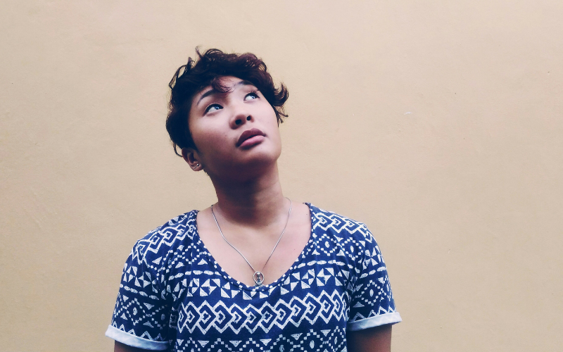 Women wearing blue dress and thinking