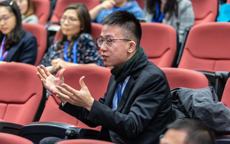Man talking in a lecture hall