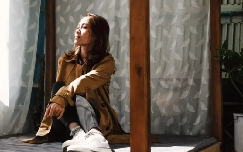 Woman looking out the window