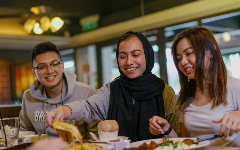 Friends eating together