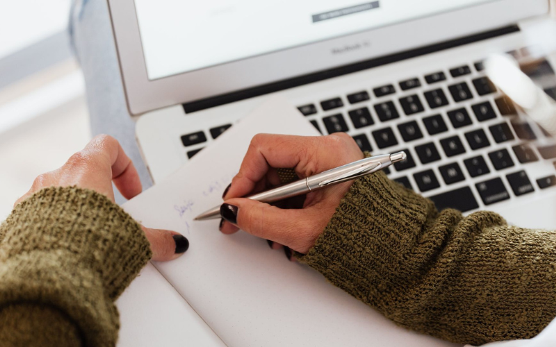 Writing in a notebook