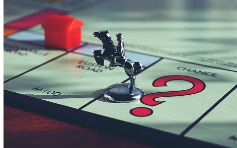 Monopoly board with a man riding horse token
