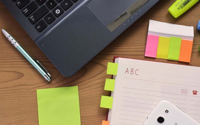 Stationery and gadgets on a table