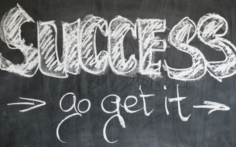 "success go get it" written on a blackboard