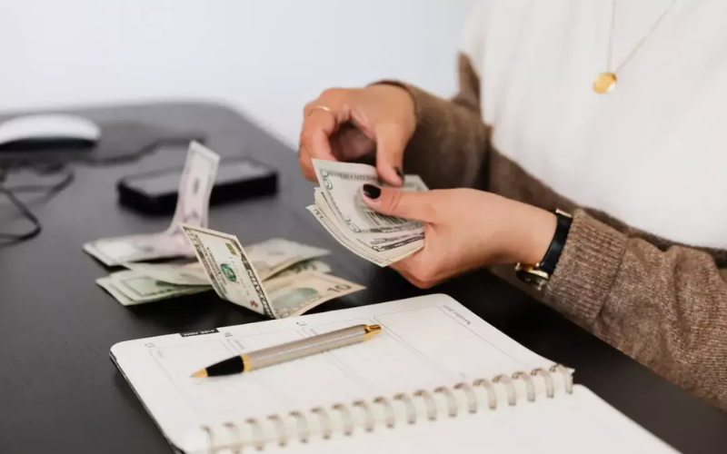 person counting money