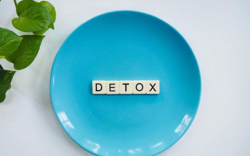 Scrabble tiles on a blue plate