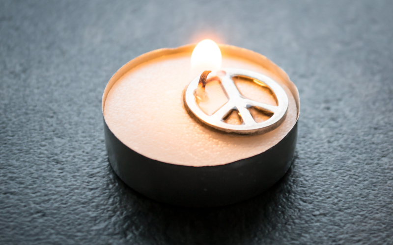 Candle with peace sign