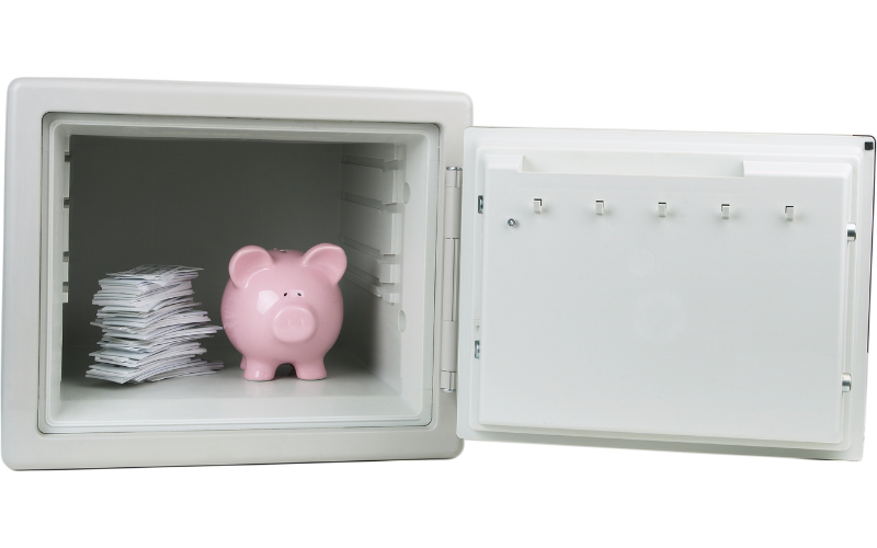 piggy bank and money in safe