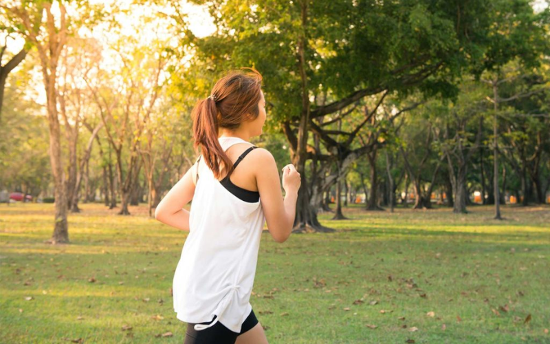 women running at a park