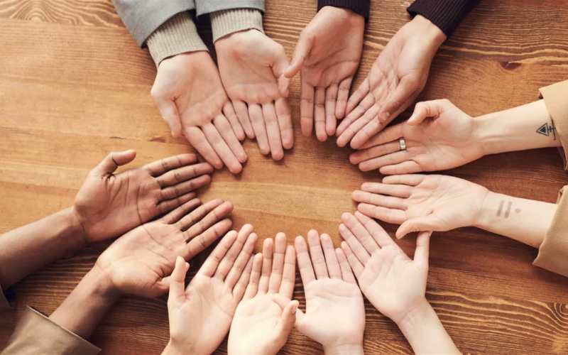 Several hands on the table