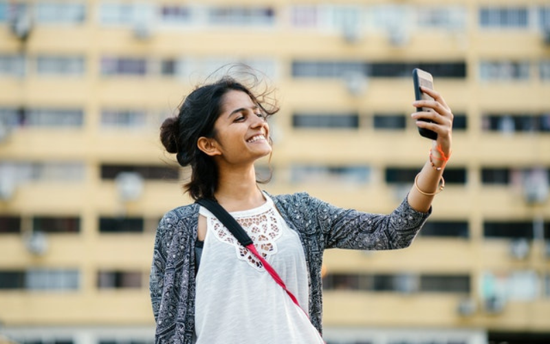 The girl is taking a selfie