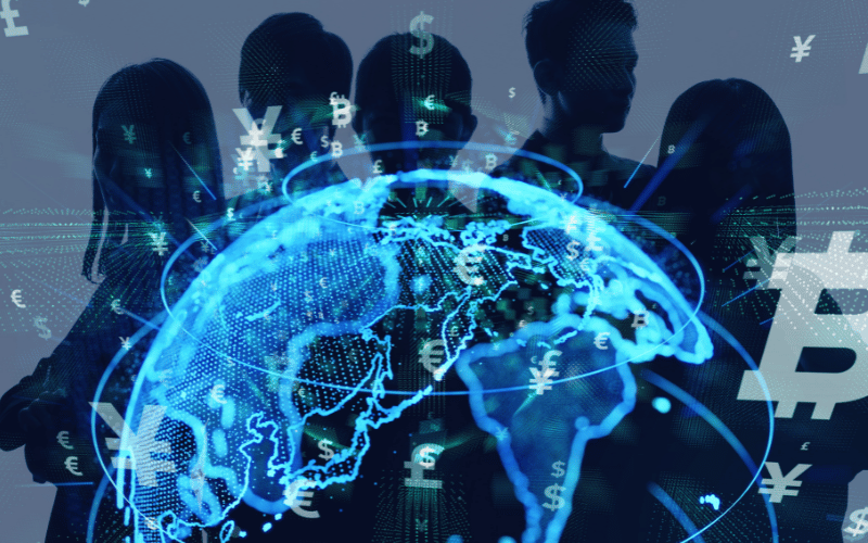 Silhouettes of people overlaid with a glowing digital world map and currency symbols