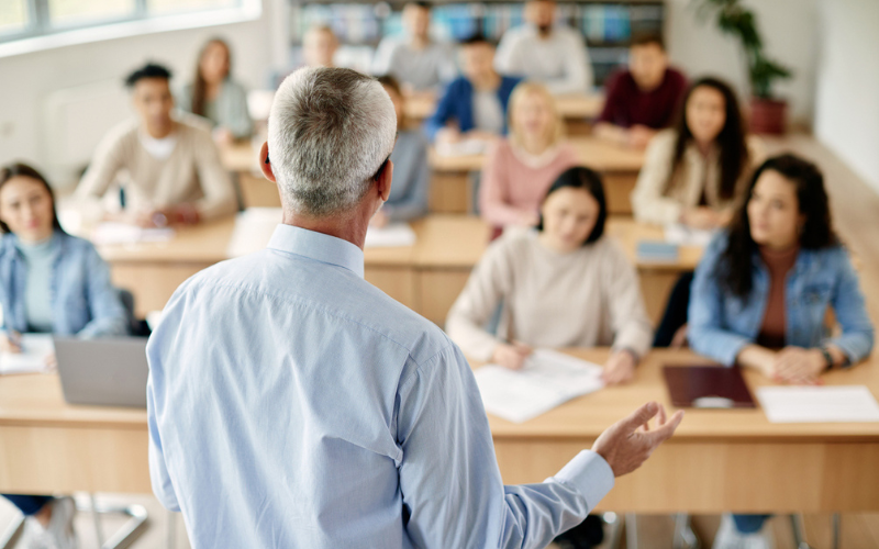 Male professor teaching a class