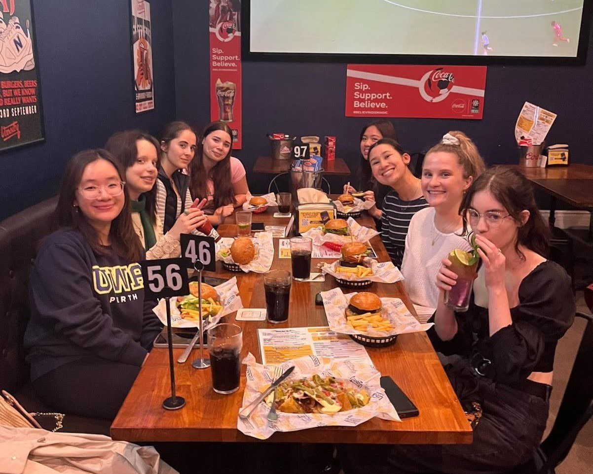 Emma and peers having a meal
