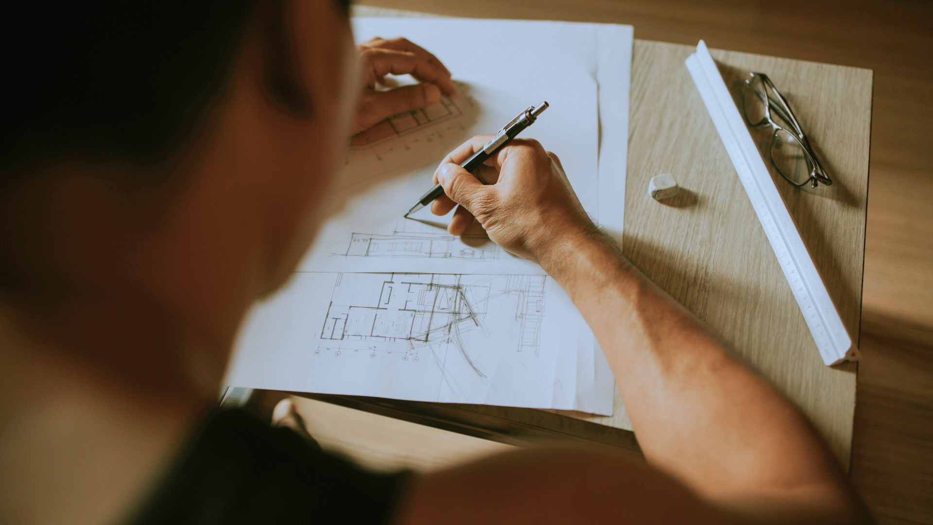 An architect drawing a building layout
