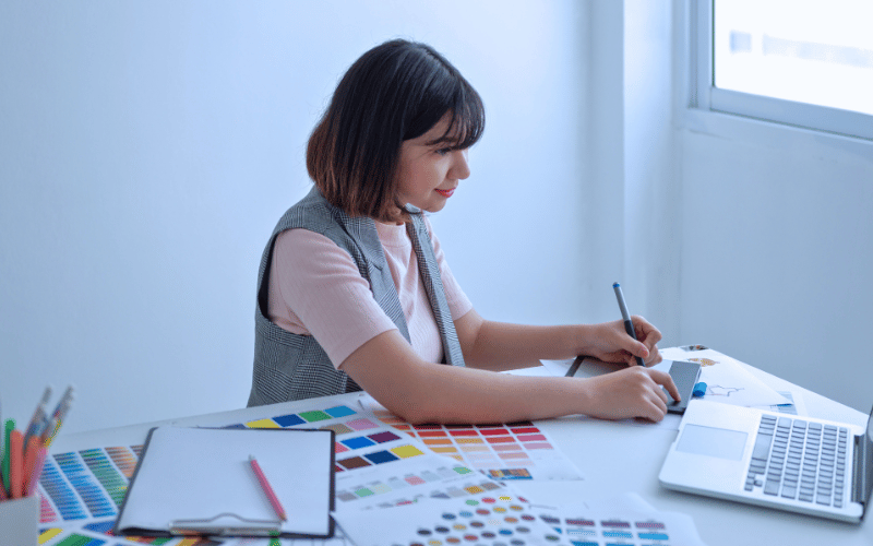 Woman drawing on a digital tablet