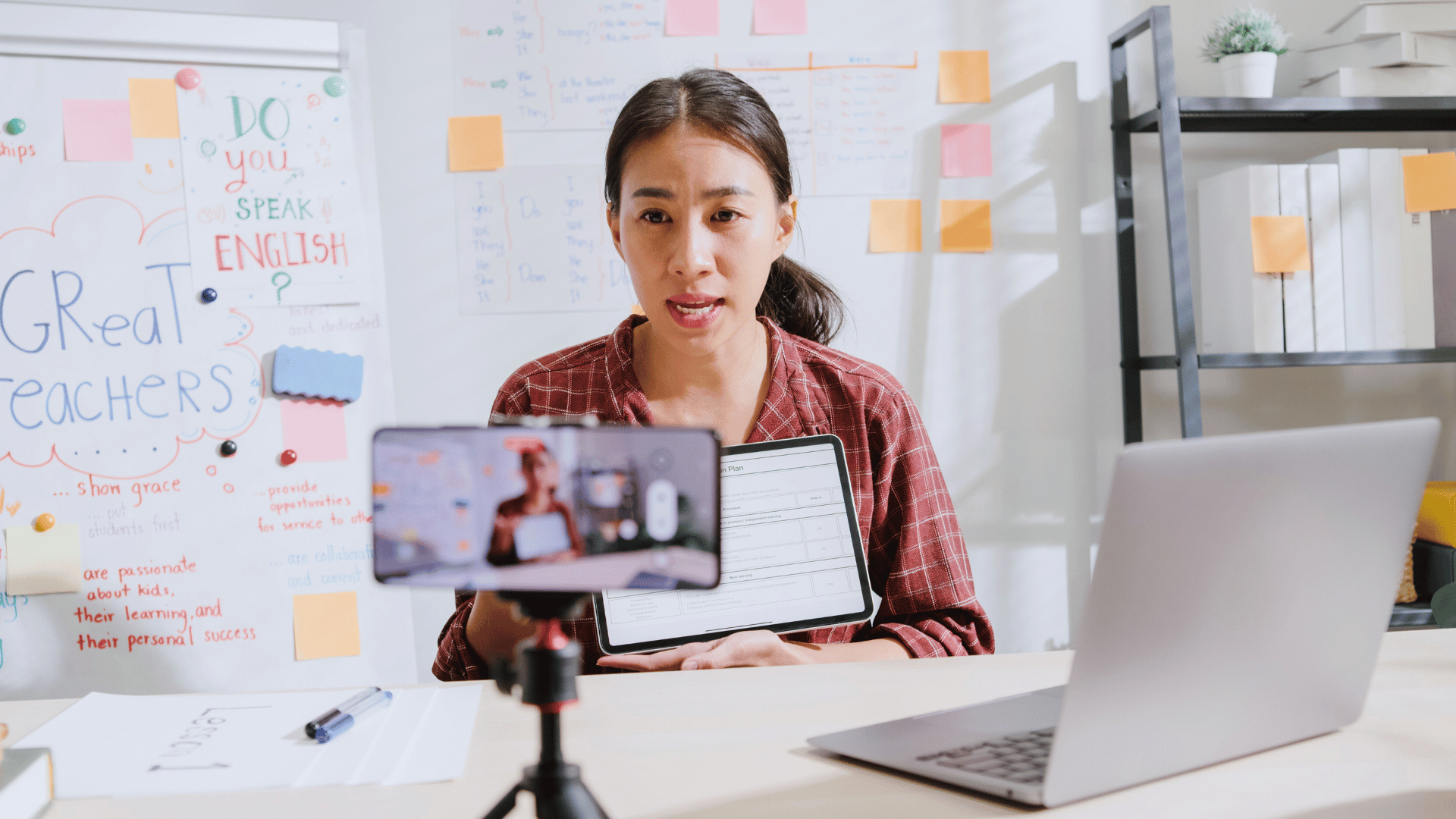 A lady livestreaming English lesson during a video call