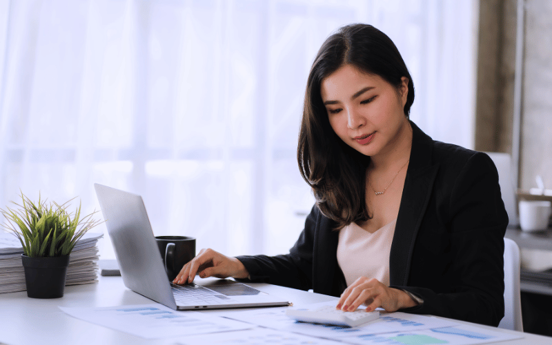 female working professional doing calculation