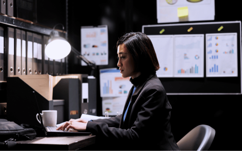 female working professional typing away in her office