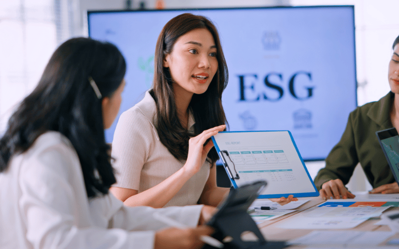 female working professional presents her ESG findings