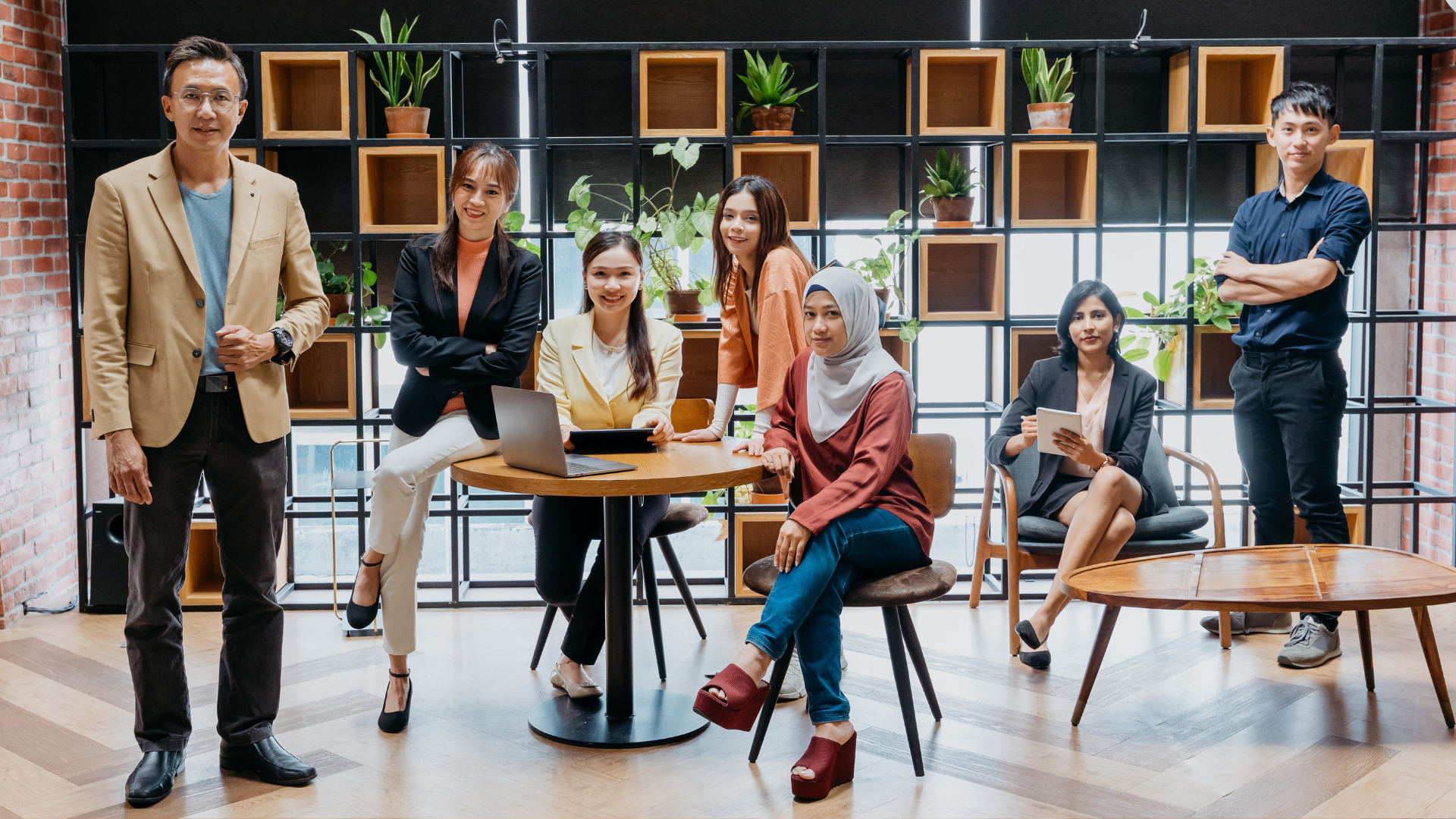 People sitting and posing for the camera