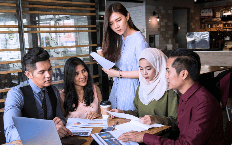 A group of finance professionals gathered together for discussion