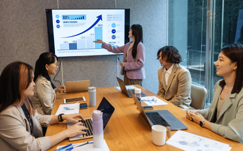 Female accountant presenting financial report during a meeting