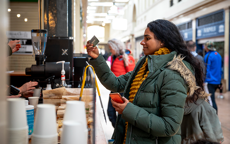 A mid adult woman on a staycation in the city of Newcastle on a sunny winters day