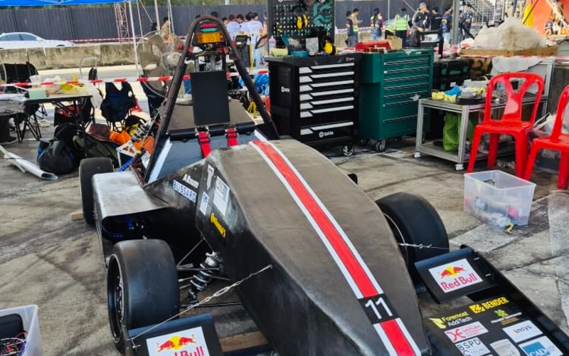 Taylor's Racing Team's electric racing car in the pit garage