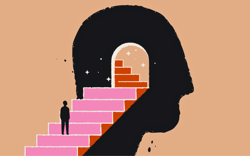 Person climbing stairs inside a head