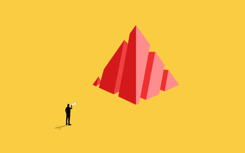 Person facing a large abstract red geometric structure