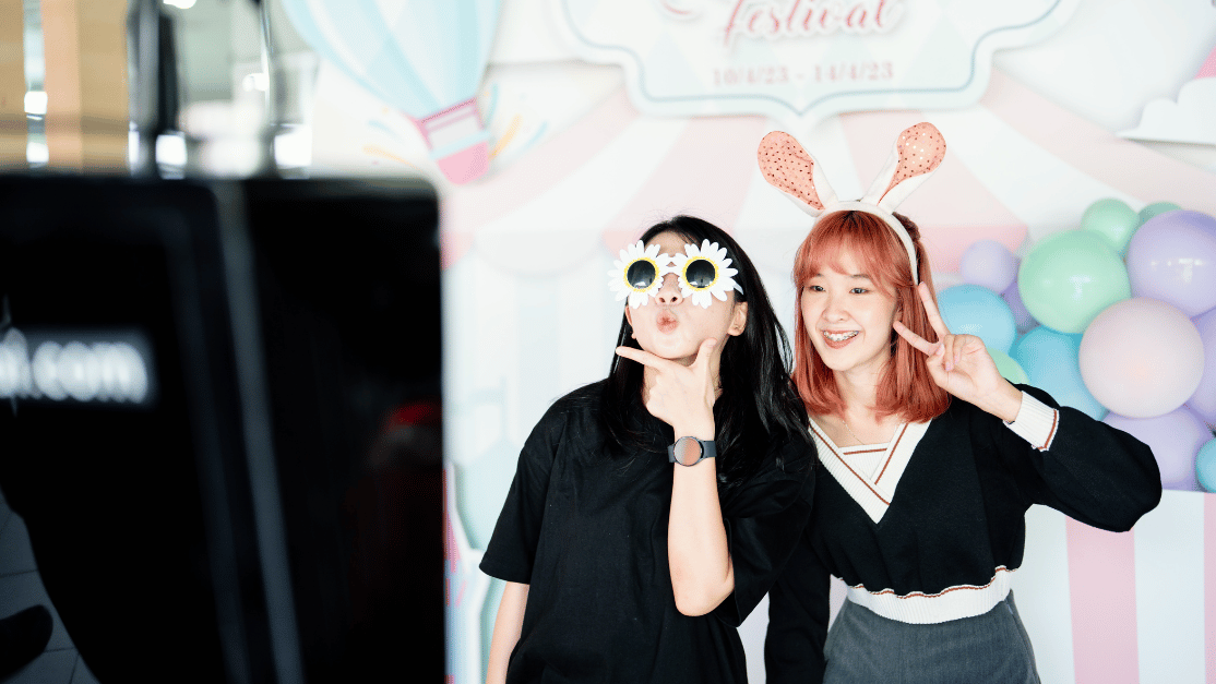 students strike cute pose in front of camera