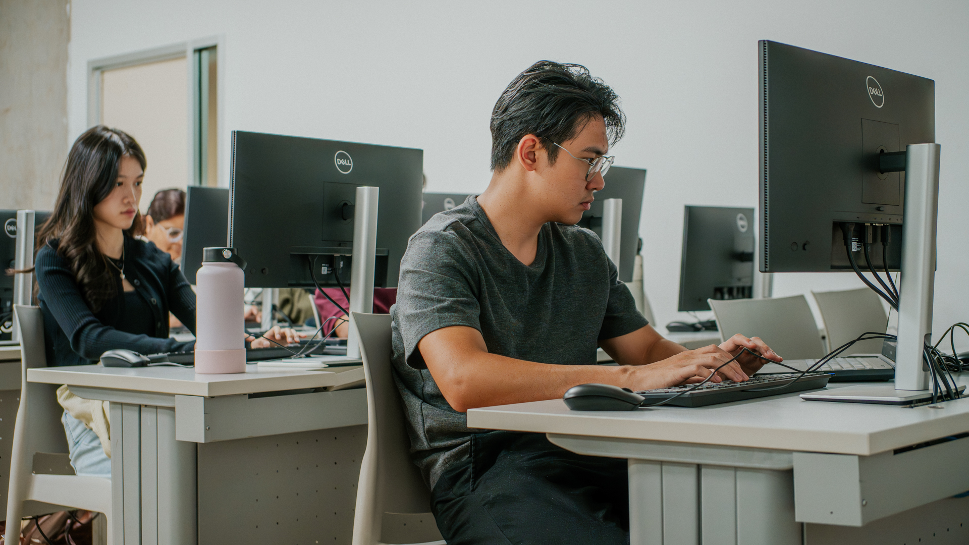 Taylor's Diploma in Accounting student typing away in aclassroom
