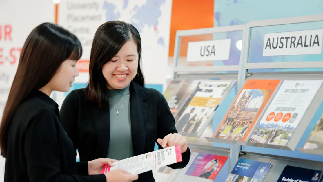 UPS advisor attends to student