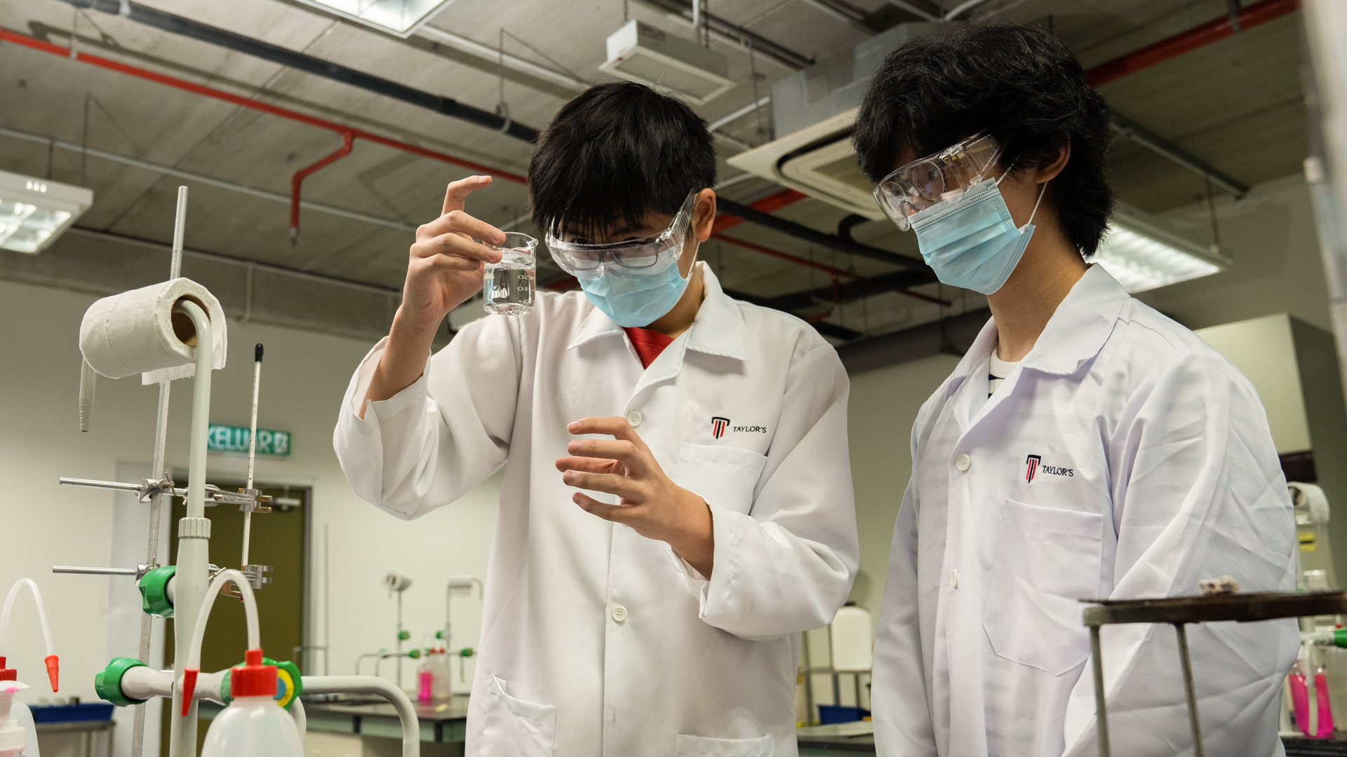 Foundation in Science students are presenting science experiment in laboratory