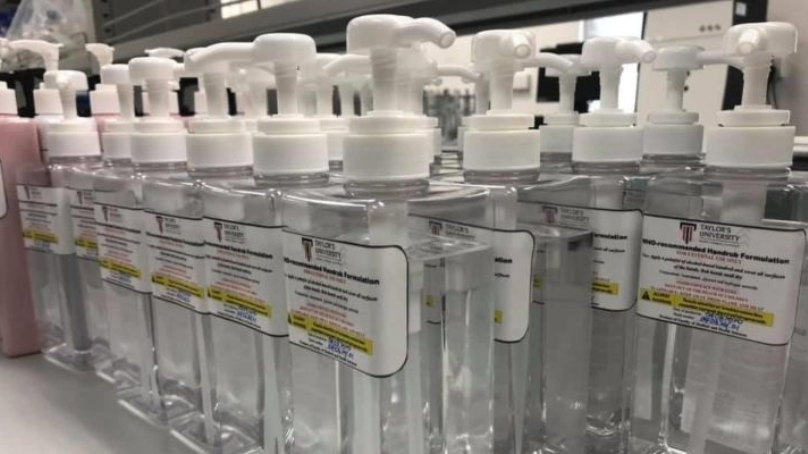 rows of large hand sanitizer bottles