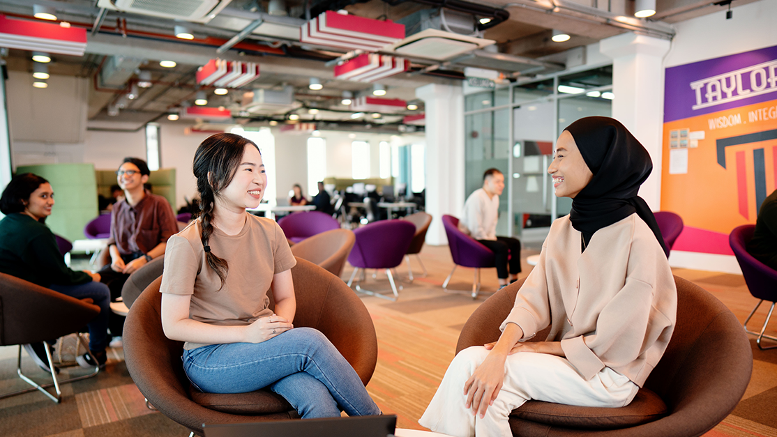 Taylor's student having discussion at the PG Lounge