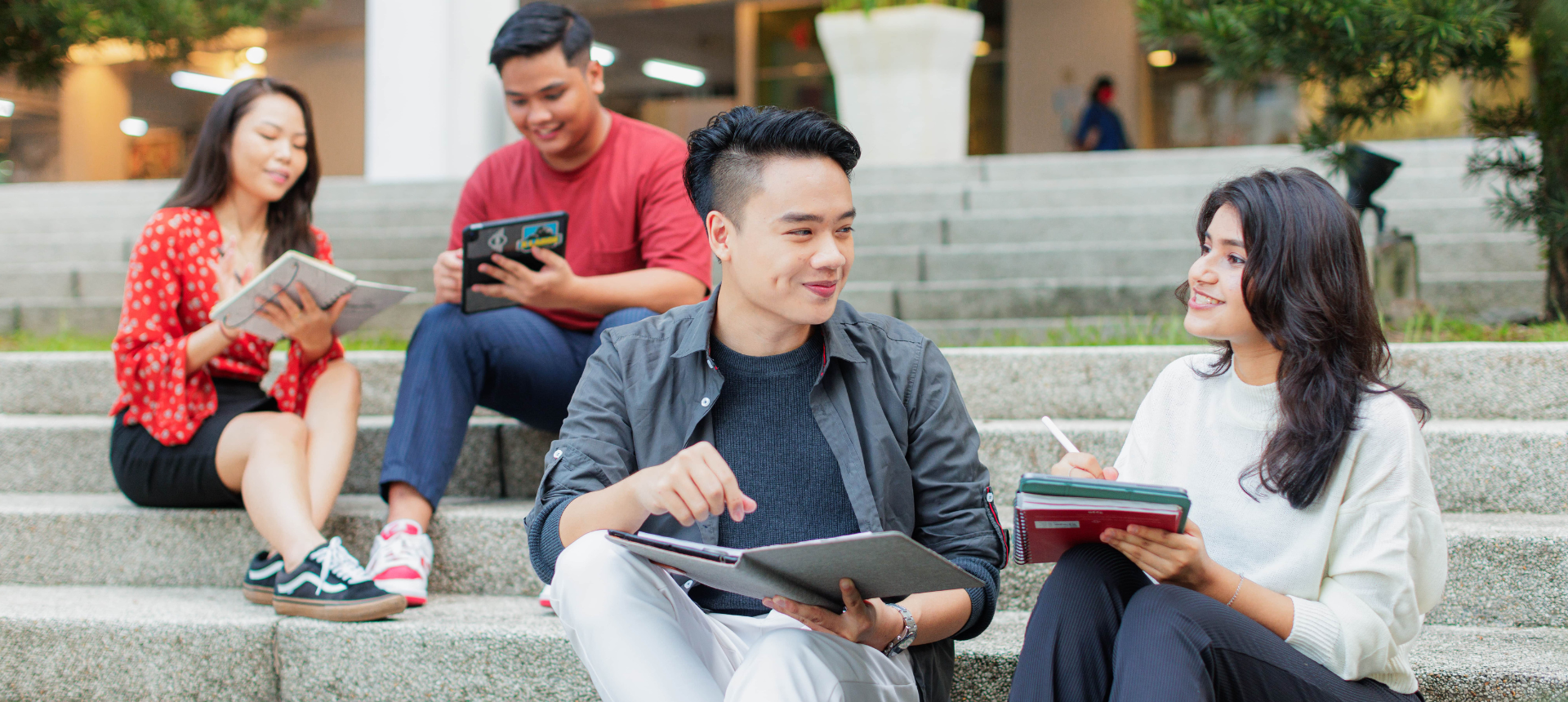 Students sitting on the stairs